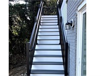<b>Trex Transcend Island Mist Decking with Black Ultralox Aluminum Railing with Handrail and White Risers</b>